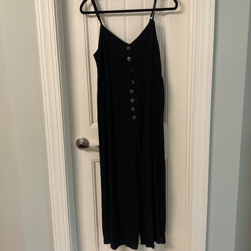 Black button-front jumpsuit